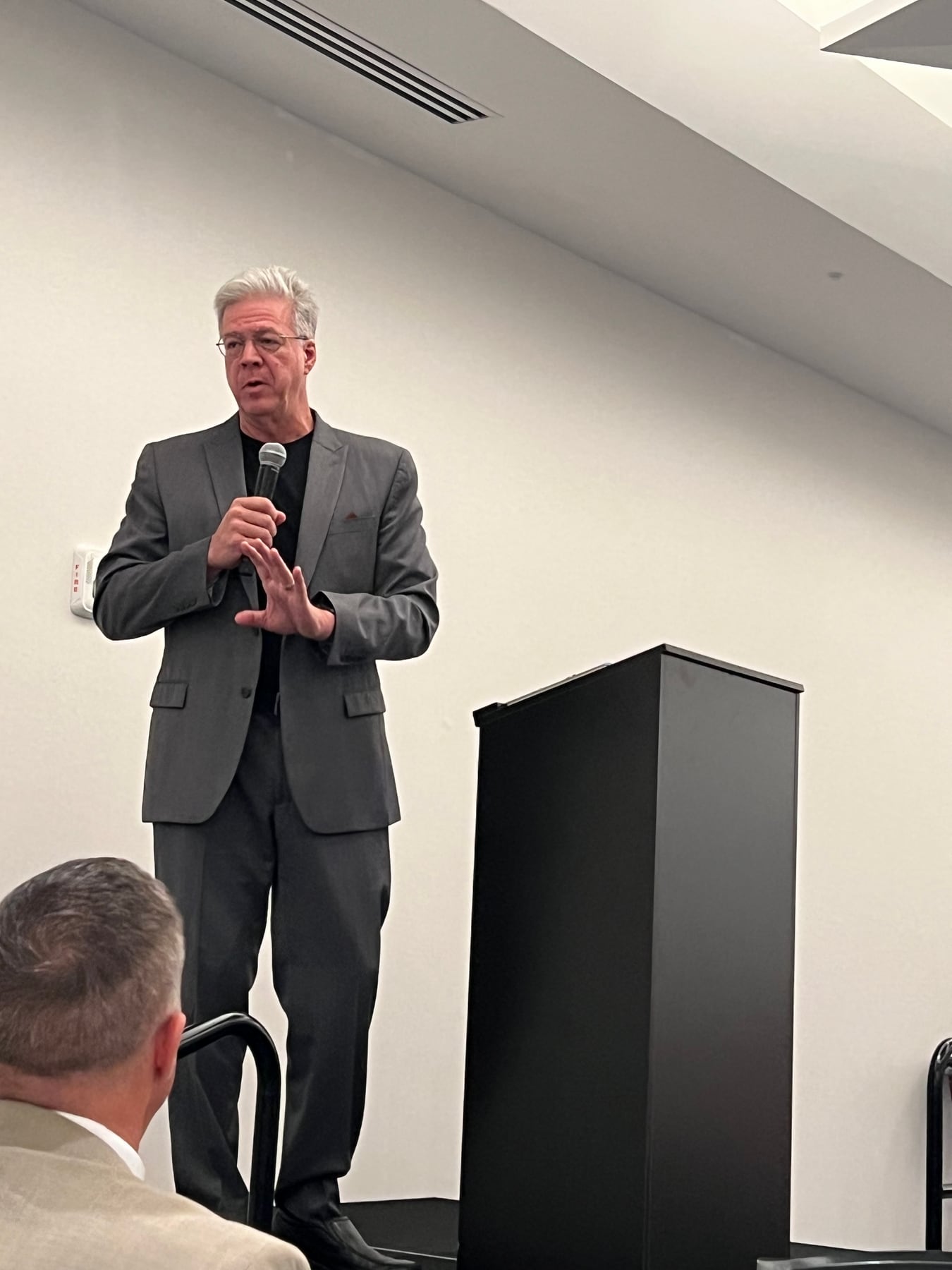 Bob Hamp speaking with a microphone